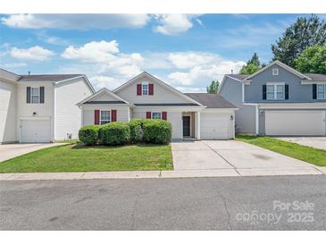 Charming single-Gathering home featuring a one-car garage and manicured landscaping at 13408 Golden Apple Ct, Charlotte, NC 28215