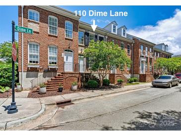 Charming brick townhome with mature landscaping and a welcoming entrance at 110 Dime Ln, Mooresville, NC 28117