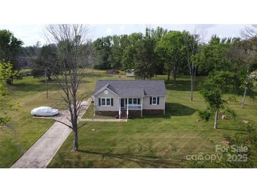 Charming one-story home with well-maintained lawn and inviting front porch at 1928 Londonberry Dr, Rock Hill, SC 29730