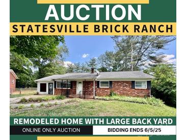 Charming brick ranch-style home with a well-maintained front yard, now available at online auction at 820 Kerley Ct, Statesville, NC 28677