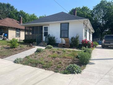 Charming single-story home with a screened-in porch and walkway at 1418 Old Wilkesboro Rd, Salisbury, NC 28144