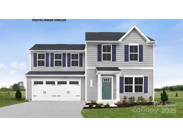 Charming two-story home with gray siding, navy shutters, attached garage, and well-maintained landscaping at 336 Maplestead St # 1080, Lancaster, SC 29720