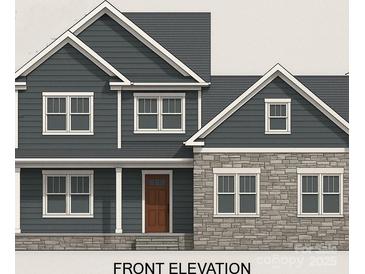 Charming new construction home with stone accents and a welcoming front entrance at 7513 Lancaster Hwy # 6, Waxhaw, NC 28173