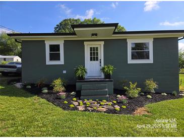 Charming single-story home boasts a well-manicured lawn, fresh landscaping, and a freshly painted exterior at 134 Snowbird Loop, Statesville, NC 28625