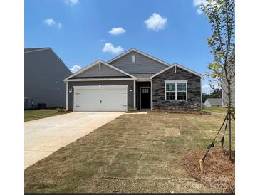 Charming single-story home with a two-car garage and stone accents at 150 Parker Claire Ln, Kings Mountain, NC 28086