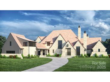 Stunning exterior elevation of a two-story home with a winding driveway and lush green lawn at 5015 Hardison Rd, Charlotte, NC 28226