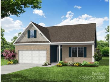 Inviting brick home with a two-car garage, lush lawn, and lovely landscaping at 123 Prestwick Way # 42, Mooresville, NC 28115
