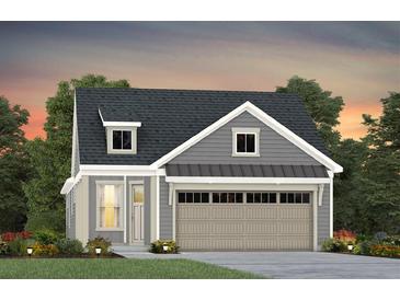 Charming single-Gathering home with neutral colors, an attached garage and beautiful landscaping at 2658 Headwind Ct # 245, Belmont, NC 28012
