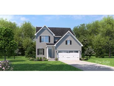 Charming two-story home with gray siding, black shutters, and a well-manicured lawn, creating a welcoming curb appeal at 490 Lenswood Ct, Denver, NC 28037