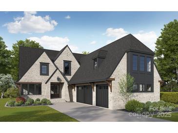 Elegant home exterior featuring a light brick facade, dark trim, and a three-car garage at 7215 Alexander Rd # 4, Charlotte, NC 28270
