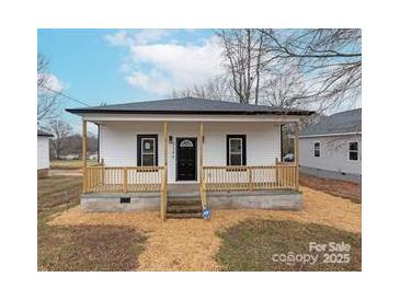 Charming single-story home featuring a cozy front porch and freshly painted exterior at 3346 York Hwy, Gastonia, NC 28052