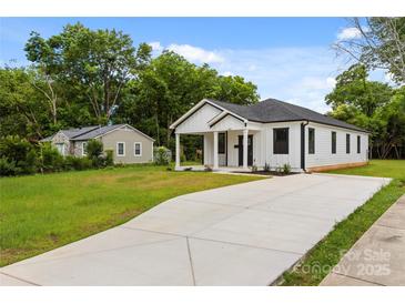 Charming renovated home with a large driveway and beautiful yard at 1016 Confederate S Ave, Rock Hill, SC 29732