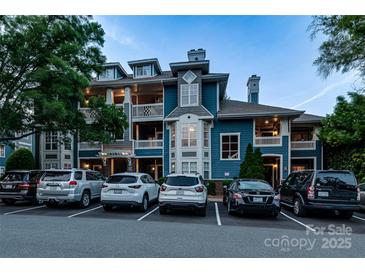 Beautiful multi-level condominium building with private balconies and ample parking spaces at 623 Olmsted Park Pl # D, Charlotte, NC 28203