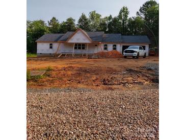Charming single-story home showcasing a new roof and bright windows under construction at 2021 Dogwood Trl, Shelby, NC 28150