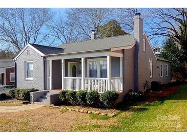 Charming single Gathering home with a covered front porch and well-maintained landscaping at 432 4Th Street Sw Pl, Hickory, NC 28602