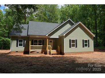 Charming home featuring a covered porch and a freshly painted exterior with black shutters at 3452 Hands Mill Hwy, York, SC 29745