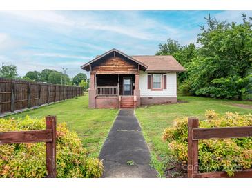 Charming single-story home with a walkway leading to the front door and a well-maintained lawn at 3 Circle Dr, Lincolnton, NC 28092