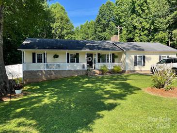Charming single-story home with a welcoming front porch and a well-manicured lawn at 4337 Gelinda Ct, Gastonia, NC 28056