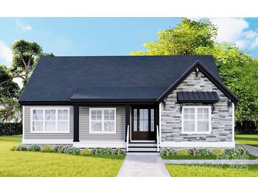 Charming single-story home featuring gray siding and stone accents, complemented by a well-manicured lawn and inviting front entrance at 3261 Enola Dr, Rock Hill, SC 29732