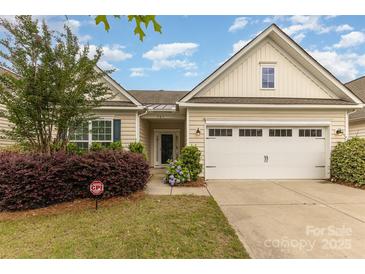Charming single-story home with landscaped yard, attached garage and security system at 527 Livingston Dr, Lancaster, SC 29720