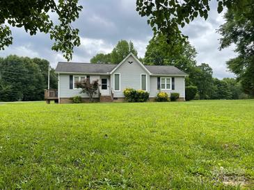 Charming single-story home with a well-maintained front yard and inviting curb appeal at 4317 Waxhaw Indian Trail Rd, Indian Trail, NC 28079