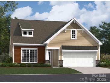 Charming two-story home featuring a two-car garage, nicely maintained lawn, and inviting curb appeal at 6298 Fairfax Ct, Maiden, NC 28650