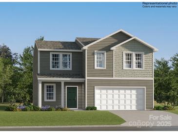 Charming two-story home with a well-manicured lawn and an attached two-car garage at 6361 Fairfax Ct, Maiden, NC 28650