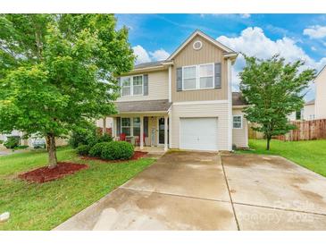 Charming two-story home with a well-manicured front yard and inviting curb appeal at 693 Carybrook Ct, York, SC 29745