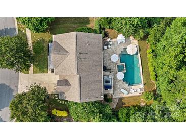Stunning aerial view of home with luxurious pool, hot tub, and outdoor entertaining area surrounded by lush landscaping at 362 Windell Dr # 67, Fort Mill, SC 29708