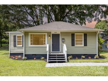 Charming single-story home featuring a landscaped front yard and welcoming entrance at 2819 Georgia Ave, Charlotte, NC 28205