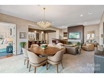 Large open concept featuring living, dining and kitchen areas at 1172 Queens Rd, Charlotte, NC 28207