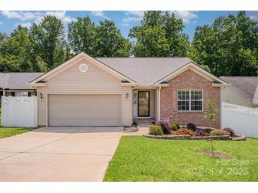 Charming single-Gathering home featuring a well-manicured lawn and a two-car garage in a desirable neighborhood at 146 Pheasant Ridge Cir, York, SC 29745