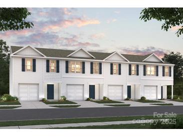 New townhome construction with white siding, black shutters and complementary landscaping at 1913 C Tranquility Cir, Newton, NC 28658