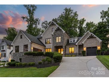 Beautiful brick home with a well-manicured lawn and professional landscaping at 5638 Timber Ln, Charlotte, NC 28270
