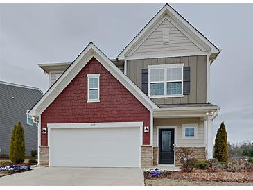 Charming two-story home with a two-car garage and a mix of siding and brick accents at 3629 Cerelia Ln, Denver, NC 28037