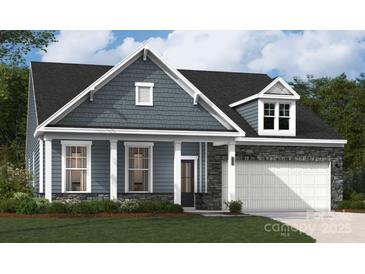 Charming single-Gathering home features stone accents, a covered porch, and a well-maintained lawn at 5119 Raging Creek Dr, Indian Trail, NC 28079