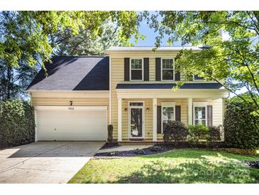 Charming two-story home featuring a two-car garage and manicured lawn at 9808 Steed Ct, Charlotte, NC 28269