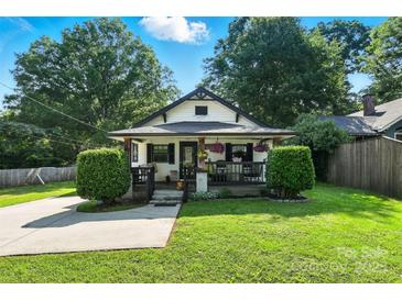 Charming bungalow style home with covered front porch and well maintained landscaping at 840 10Th Street Nw Blvd, Hickory, NC 28601