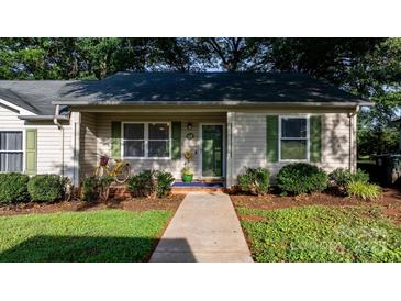 Charming single-story home featuring a tidy front yard and inviting entrance walkway at 1124 St. Charles Ct # 3, Newton, NC 28658