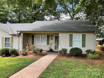 Charming single-story home with a cozy front porch and a welcoming walkway at 1124 St. Charles Ct # 3, Newton, NC 28658