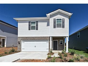 Charming new two-story home with a brick facade and a two-car garage at 1442 31St Ne St, Conover, NC 28613