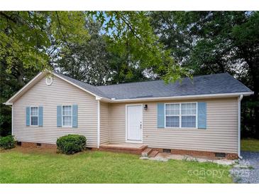 Charming single-story home featuring light siding, blue shutters, and a well-maintained lawn at 201 Killian Cir, Clover, SC 29710