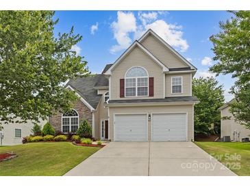 Charming two-story home with a two-car garage and well-maintained front lawn at 516 Cool Creek Dr, Rock Hill, SC 29732