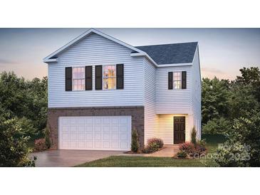 Inviting two-story home with a two car garage, white siding, black shutters and manicured landscaping at 1049 Horizon Ln, Chester, SC 29706