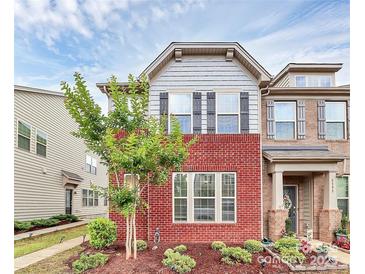 Charming brick front exterior with manicured landscaping and inviting curb appeal at 5391 Orchid Bloom Dr, Indian Land, SC 29707