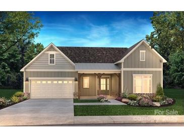 Charming single-Gathering home featuring a two-car garage, inviting porch, and beautiful landscaping at 5709 Caneel Ln # 994, Denver, NC 28037