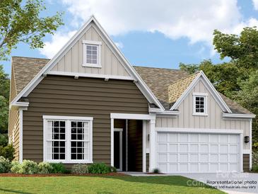 Charming one-story home featuring a 2-car garage, neutral color palette, and manicured lawn at 6352 Fairfax Ct, Maiden, NC 28650