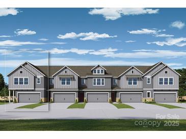 Charming townhome with a gray exterior, a one-car garage, and lush green lawn at 164 Quartz Hill Way, Waxhaw, NC 28173