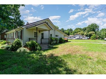 Charming one-story home with a covered front porch and well-maintained lawn at 3425 Long Ferry Rd, Salisbury, NC 28146