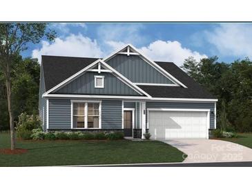 Charming single-Gathering home with a well-manicured lawn, gray siding and an attached two-car garage at 939 Exeter Dr, Sherrills Ford, NC 28673